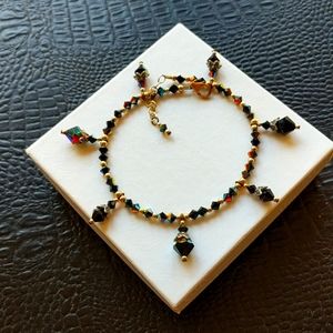 Anklet.  Gold with iridescent beads and Moroccan design dangled beads. 10 inch.